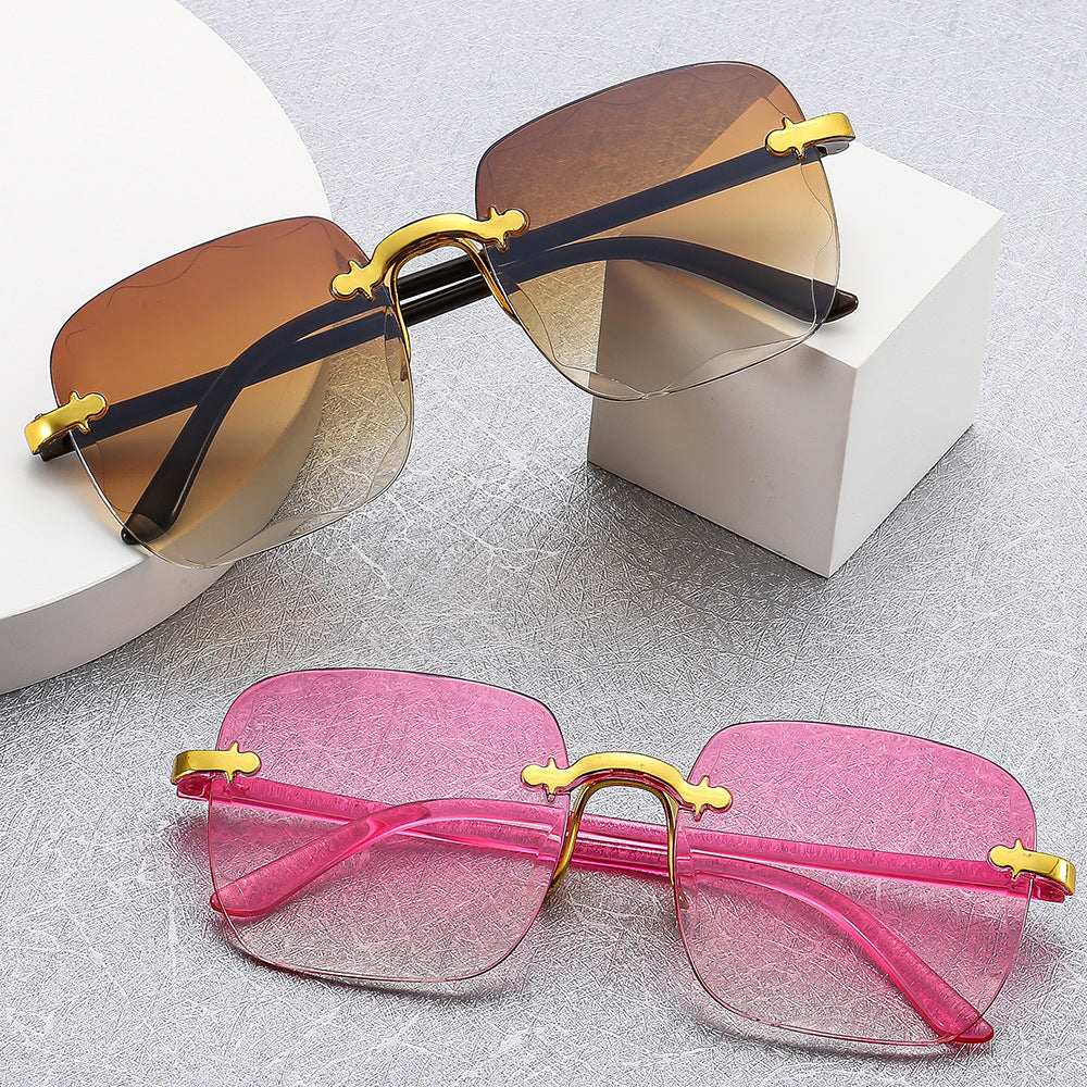Stylish and Modern Frameless Sunglasses – Elegant Design for Women